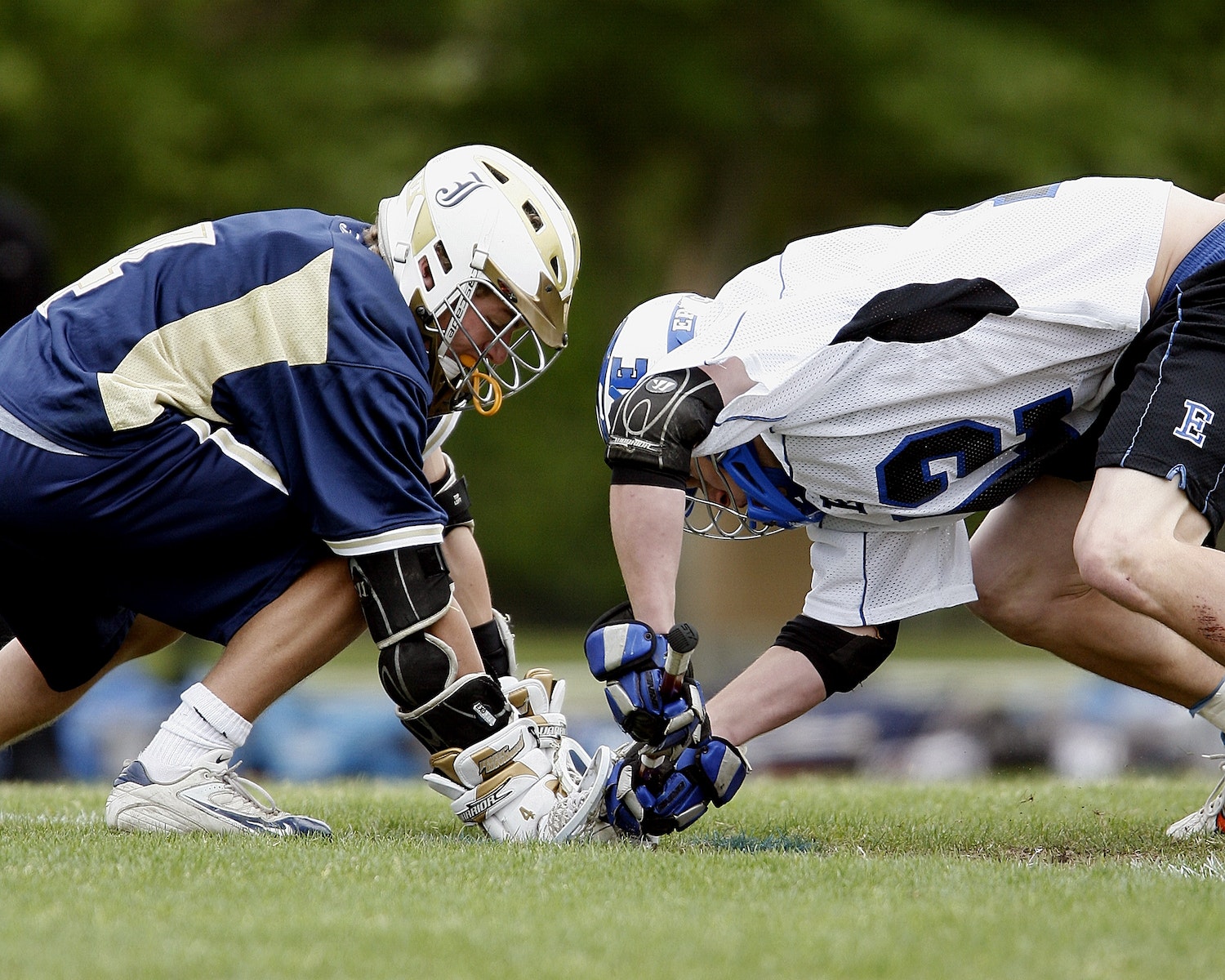 Selective Focus Photography of Two Men Playing American Football